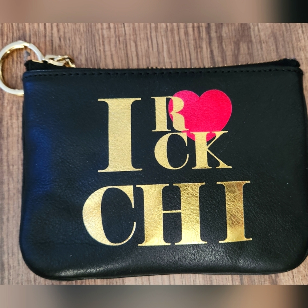 Rebecca Minkoff pouch zips, with gold ring attached. Looks new!